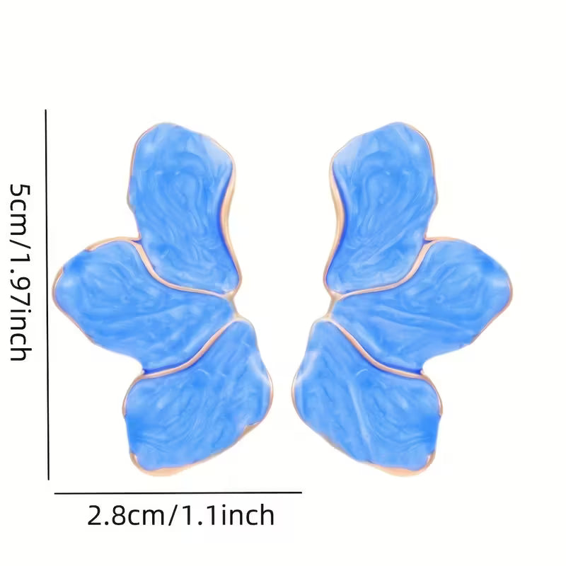 Pendientes Flor Dorados – El toque elegante que transforma tu rostro
