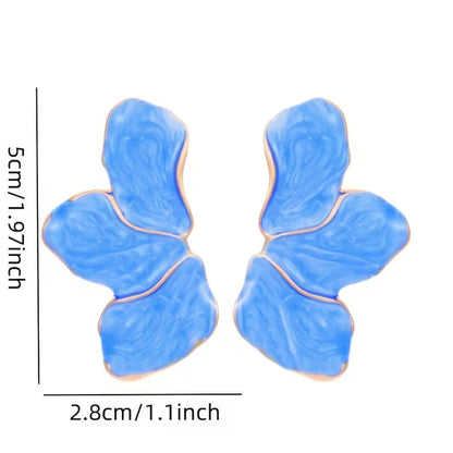 Pendientes Flor Dorados – El toque elegante que transforma tu rostro